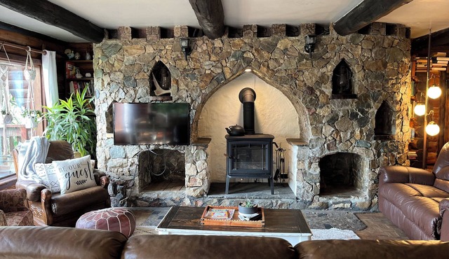 Rustic log home retreat on Mara Hills Golf Resort with lake view.