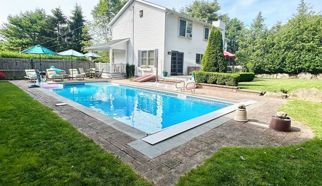 Spacious 5bdrm home- saltwater pool, WiFi, AC, private beach parking pass