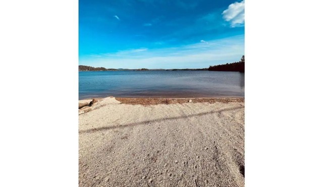 Spacious camper with sandy beachfront access!