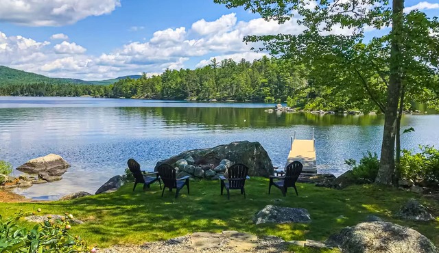 Spacious Lakefront Home with a Sandy Beach, Kayaks, and Stunning Panoramic Views