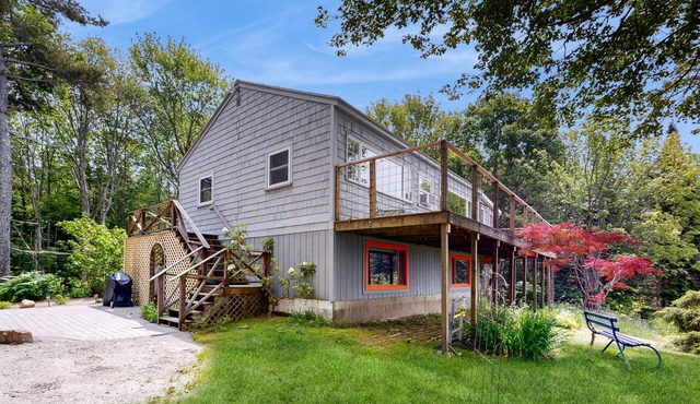 Water view home with scenic balcony, grill, board games, and AC
