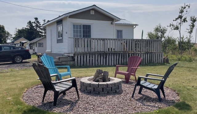 Water View Tiny Cottage with Private Fire Pit & Beach Access in Summerside